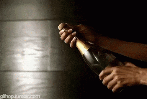 champagne bottle popping gif