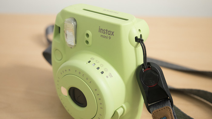 alvin pinto reccomend how to put strap on polaroid camera pic