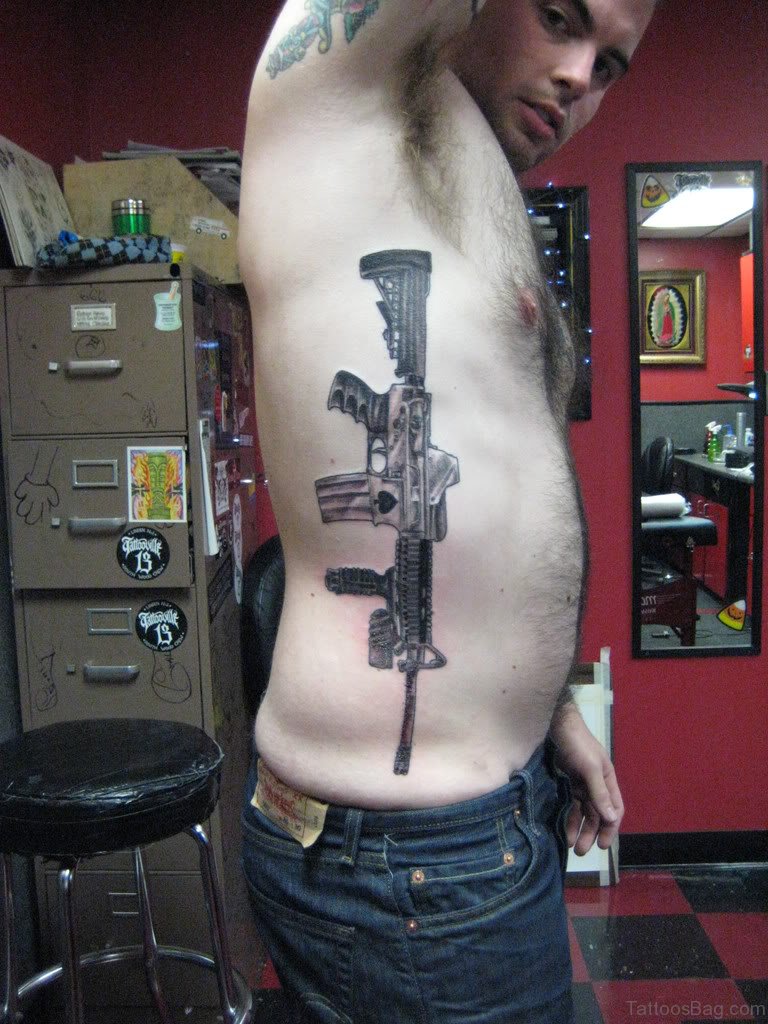 debbie kirkup reccomend big guns tattoo pic