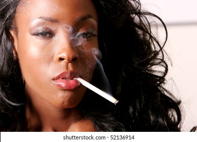 naked women smoking cigarettes