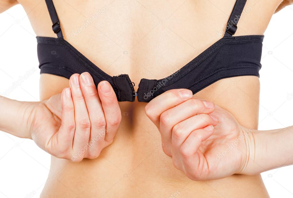 woman taking off bras
